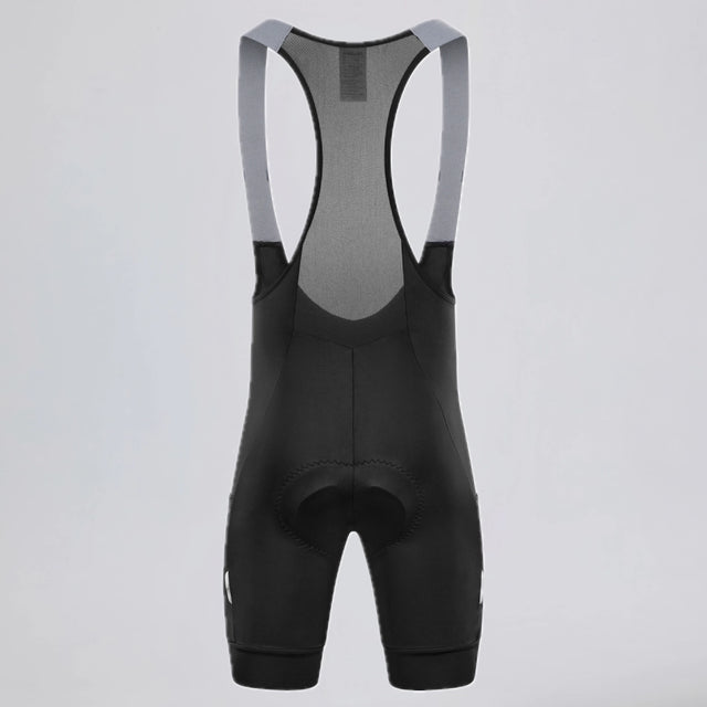 Back view of black men's off-road bib shorts with gray mesh straps.