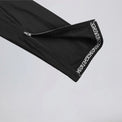 Close-up of the ankle zipper and leg gripper on men's winter fleece cycling bib tights.