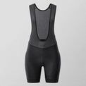 Front view of black women's road cycling bib shorts.