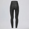 Back view of women's black lightweight cycling tights with side pockets and ankle zippers.