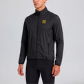 Front view of a model wearing the black men's lightweight windproof cycling jacket.