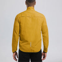 Back view of a model wearing the orange men's lightweight windproof cycling jacket.