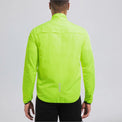 Back view of a model wearing the green men's lightweight windproof cycling jacket.