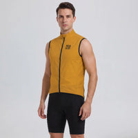 Front view of a model wearing an orange men's windproof cycling vest.