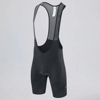 Front three-quarter view of black men's gravel endurance bib shorts.
