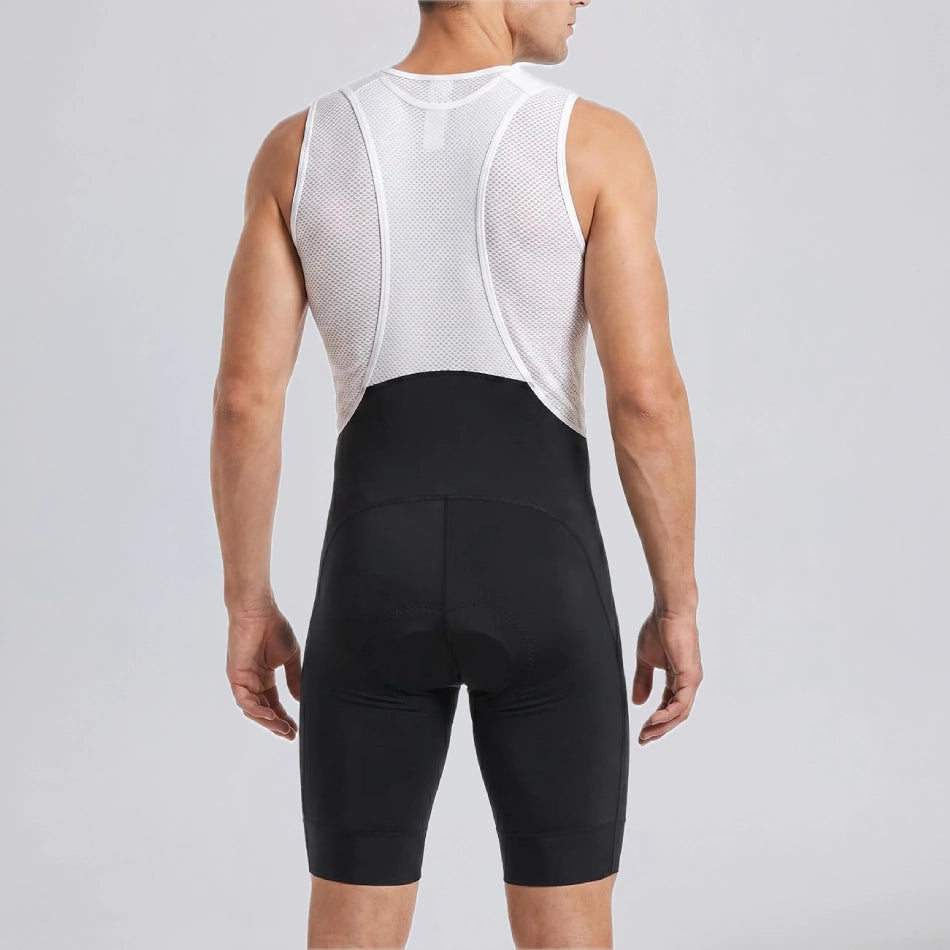 Back view of a model wearing black men's MTB endurance bib shorts.