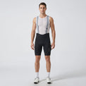 Men’s long distance cycling bib shorts front view showing ergonomic fit, straps, and compression design