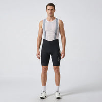Men’s long distance cycling bib shorts front view showing ergonomic fit, straps, and compression design