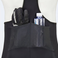 Men’s long distance cycling bib shorts showing rear mesh pocket storing gloves and water bottle