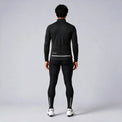 Back view of a model wearing a black men's winter cycling jacket.