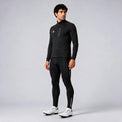 Front three-quarter view of a model wearing a black men's winter cycling jacket.