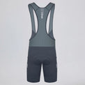 Back view of gray men's cycling bib shorts with reflective details.