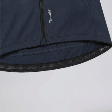Close-up of Przewalski men's cycling jersey silicone hem gripper and front zipper detail