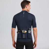 Back view of Przewalski men's cycling jersey with loaded rear pockets for road rides