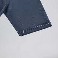 Close-up of Przewalski men's cycling jersey silicone arm gripper and striped sleeve fabric